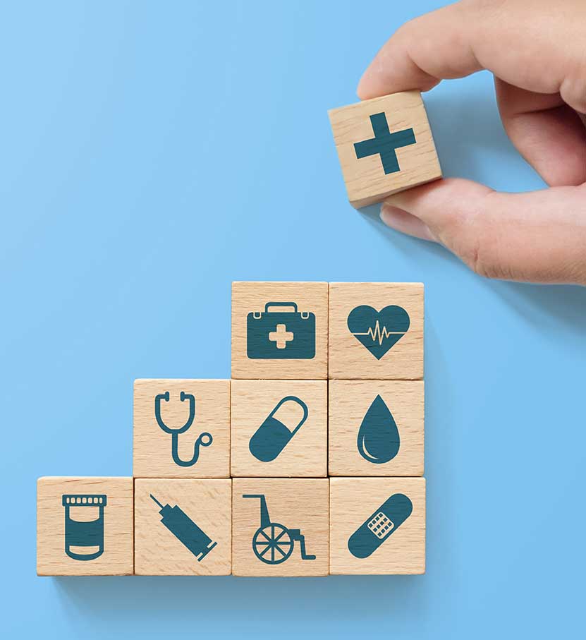 Wood blocks with medical icons on them